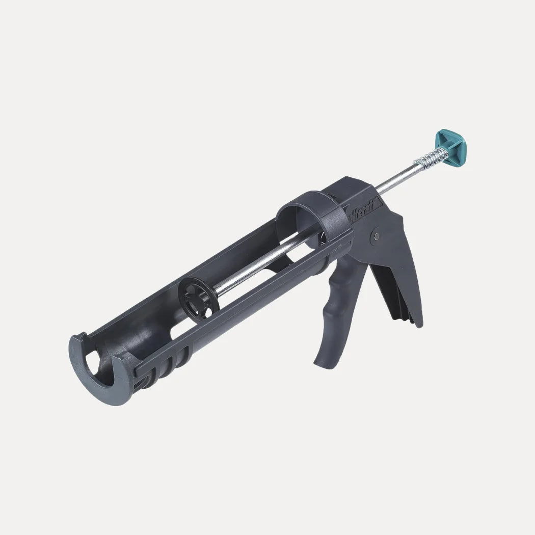 A picture of the cartridge gun from stonearts®, a black and blue-green cartridge gun with a metal rod for applying sealant. This tool has a trigger handle to control the flow of material and a cylindrical cartridge holder with open sides for easy filling and removal. The caulking gun appears to be made of metal and plastic.